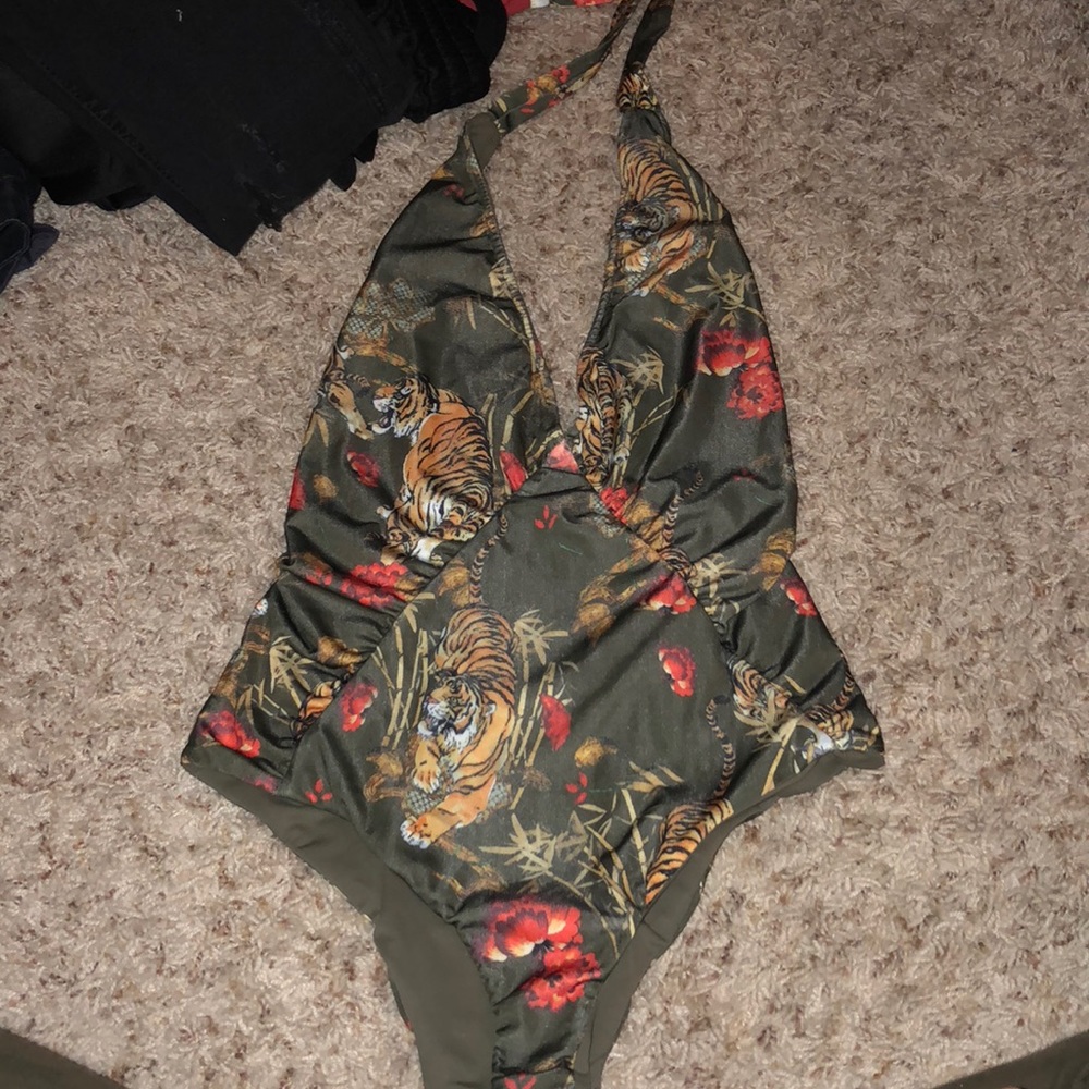 Green jungle one piece suit